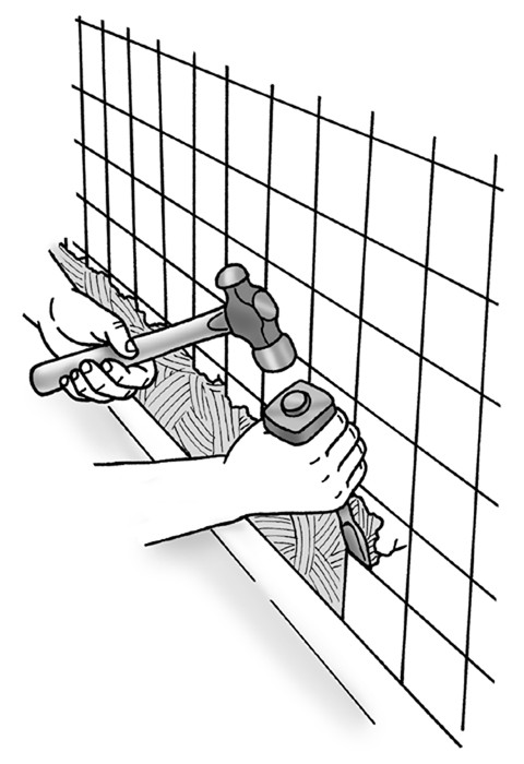 Figure 6-1: When removing a tub, carefully chip out the first row of tile with a cold chisel.